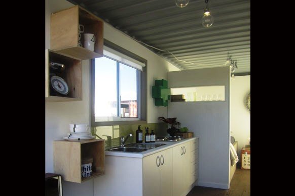 TOP DESIGN? SHIPPING CONTAINER ARCHITECTURE MEETS A REALITY TV SHOW