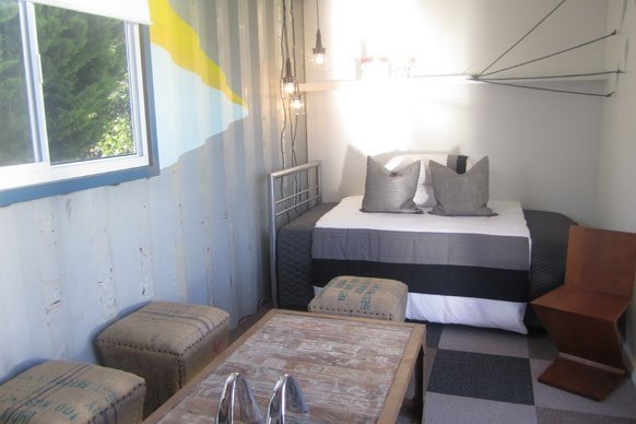 TOP DESIGN? SHIPPING CONTAINER ARCHITECTURE MEETS A REALITY TV SHOW