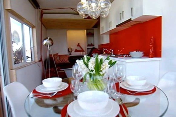 TOP DESIGN? SHIPPING CONTAINER ARCHITECTURE MEETS A REALITY TV SHOW
